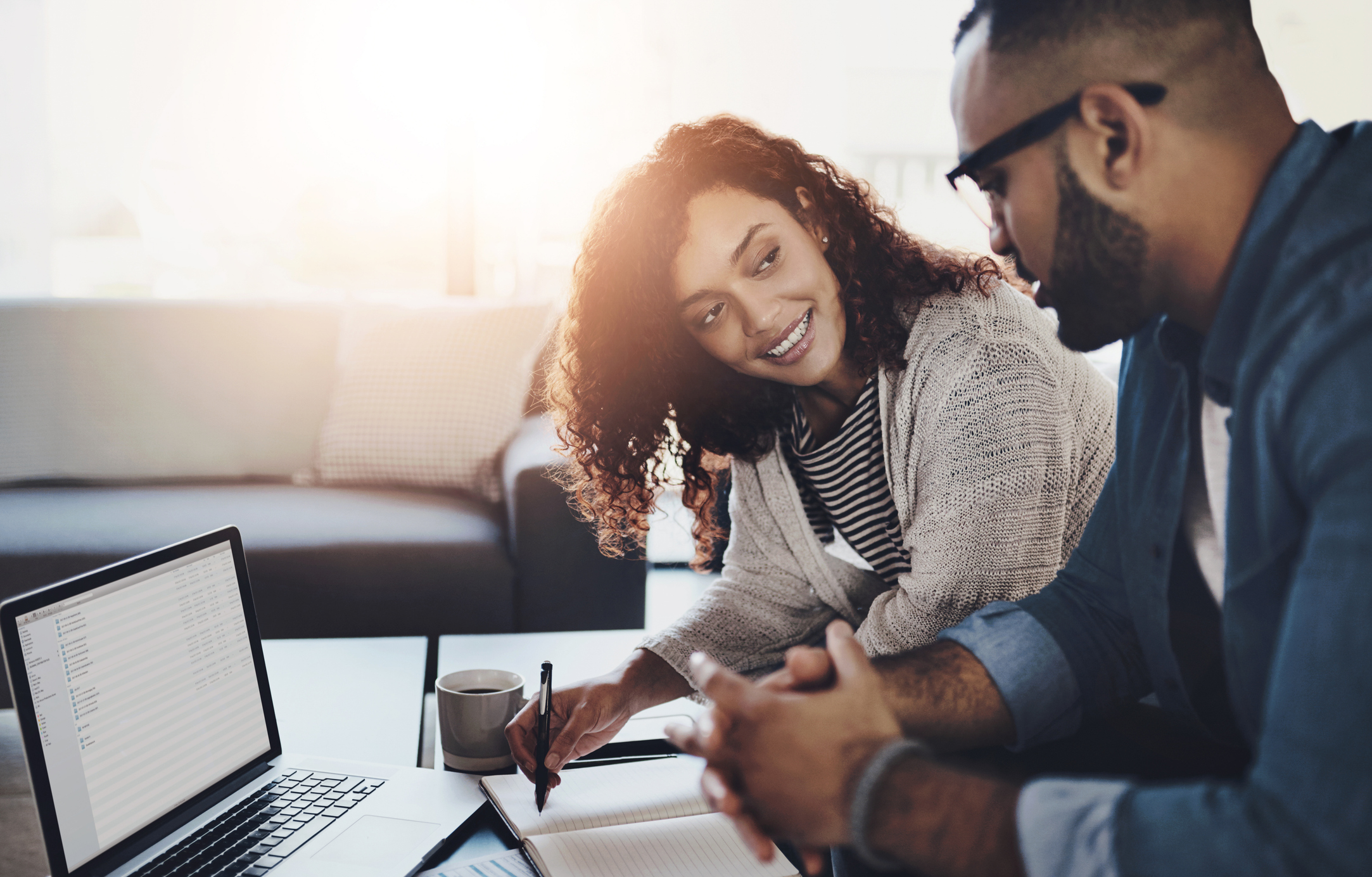 a woman and man discussing finances