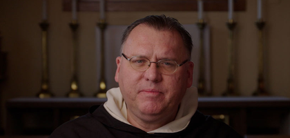 Rev Jonathan Kalisch looks at the camera.