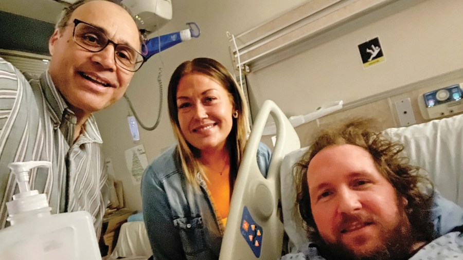 Roger Foley (right), a man with an acute neurological disease with Lino DeFacendis (left) and Amber Scharf.