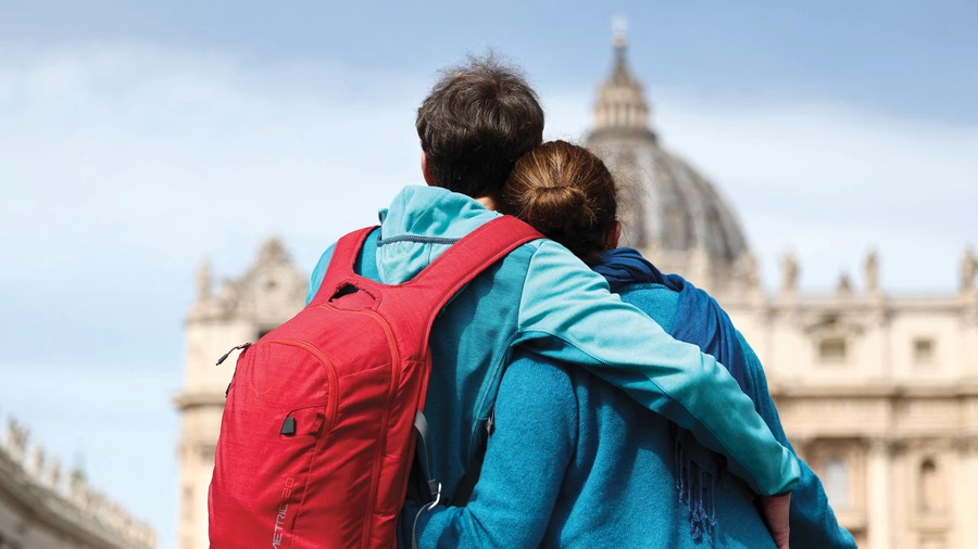 A young couple is pictured in Rome.