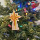 A Christmas ornament recalls the Star of Bethlehem.