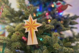 A Christmas ornament recalls the Star of Bethlehem.