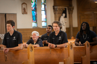 Knights pray a rosary at Our Lady of the Rosary Parish.