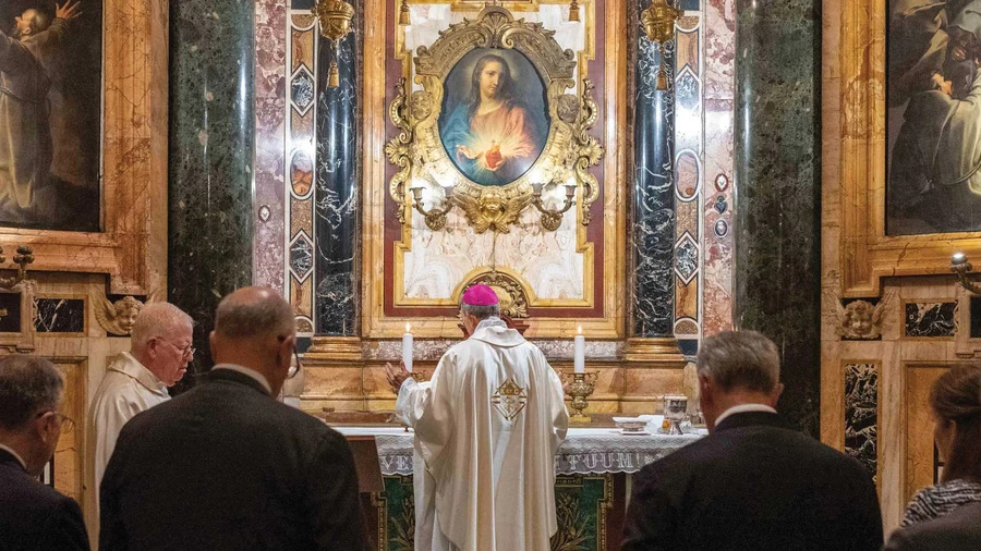 Archbishop William Lori celebrates Mass in the Church of the Gesù in Rome on Oct. 23, 2024.