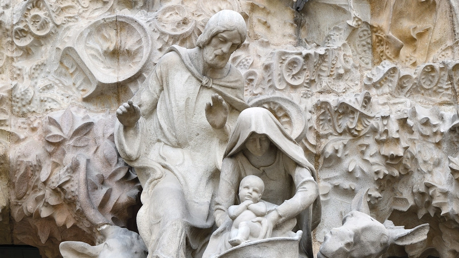 A detail of the Holy Family is seen on the Portal of Charity of the Sagrada Família’s east-facing Nativity façade.