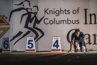 Brandon Harris settles into the starting blocks for a practice run prior to a race at the K of C Indoor Games in Saskatoon on Jan. 23.