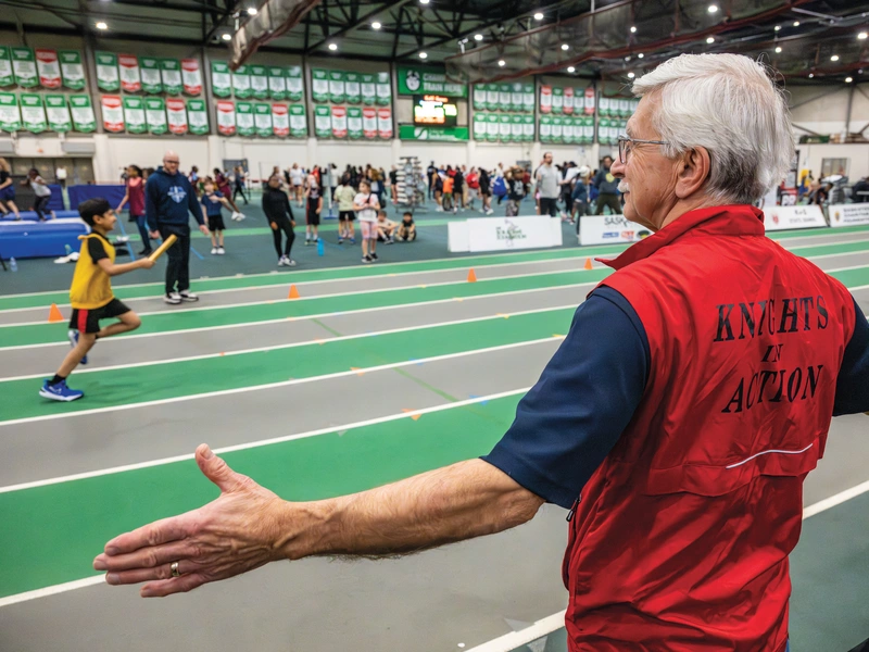 Rick Dupuis volunteers on the sidelines at Saskatoon Field House on the University of Saskatchewan campus Jan. 22. 