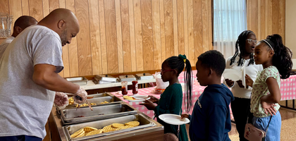 Financial Secretary Matthew Jenkins of St. Benedict the Moor Council 10274 in Savannah, Ga., serves breakfast to children at the council’s annual breakfast for the youth faith formation program at St. Benedict the Moor Catholic Church. About 60 children, parents and program leaders attended to kick off the new academic year and welcome Father Anselm Eke, the new pastor and a brother Knight.