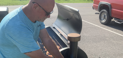 Grand Knight Jim Moss of Father Puetz Council 6550 in Harrisonville, Mo., grills chicken for the annual Smoke’n for Jesus barbecue competition and community meal at Harrisonville Community Church. Council 6550’s team, representing Our Lady of Lourdes Parish, competed against nine other local churches for the event, which gathered hundreds for Christian fellowship. Council members were also able to share information about the Catholic Church to several people who inquired.