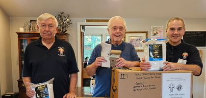 Knights from Bishop Hugh C. Boyle Assembly 922 in Washington, Pa., display socks collected during the assembly’s “Socks for Souls” campaign. The campaign, held over two weeks at 13 churches with support from three K of C councils, collected nearly 2,000 pairs of new socks for veterans and their families.