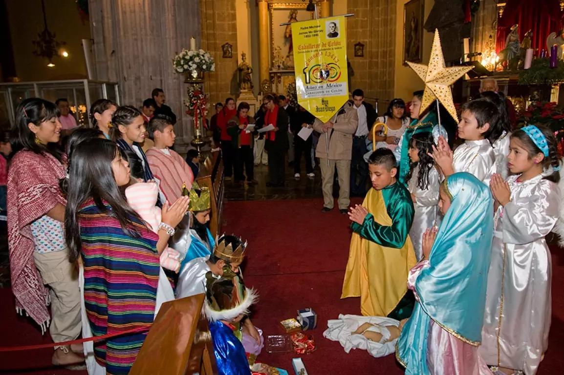 Group of children acting in nativity play.