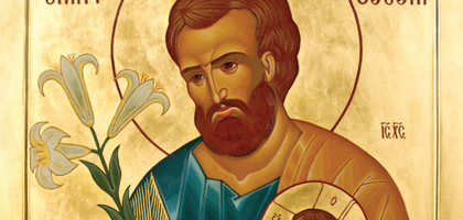 Joseph holding baby Jesus.