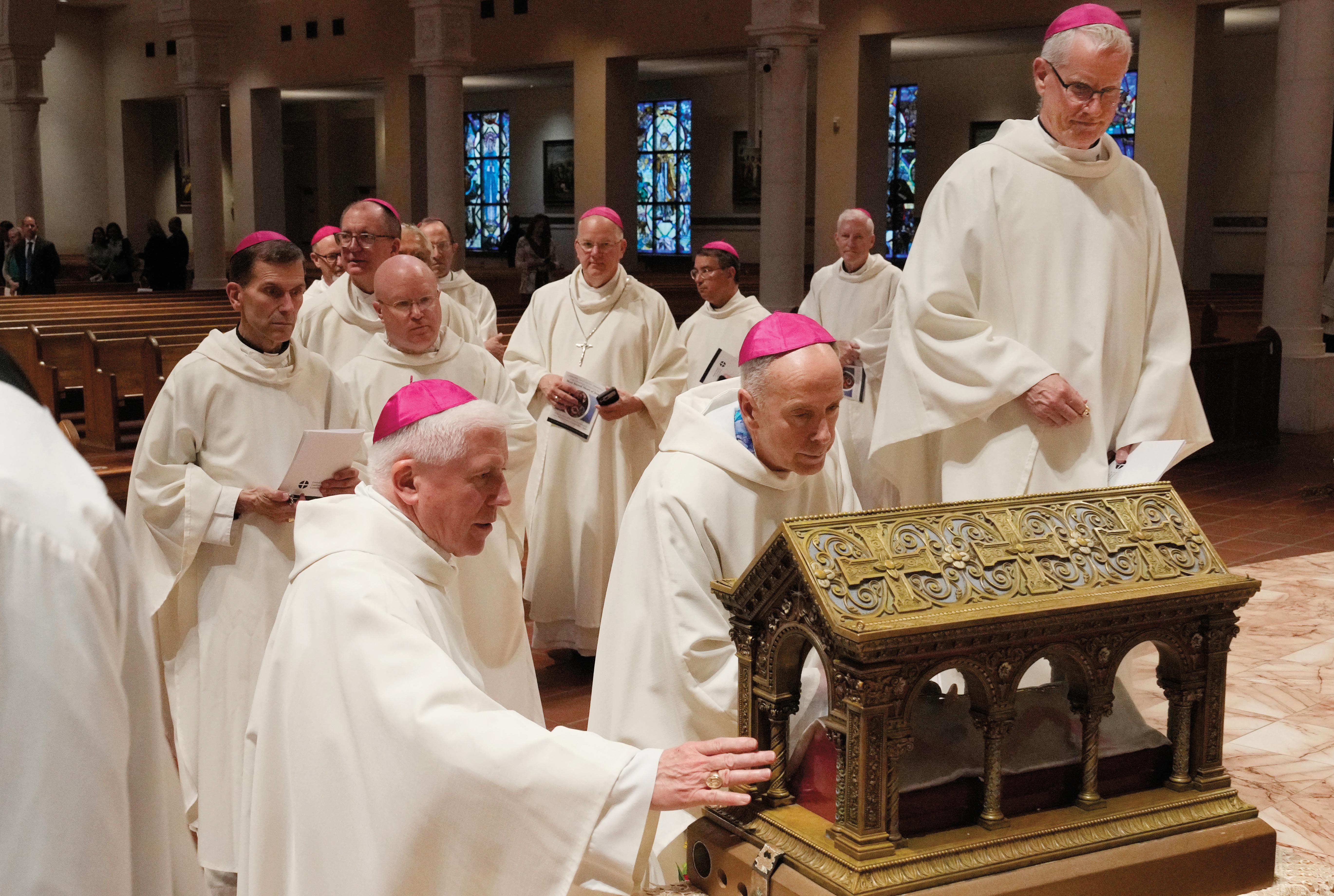 U.S. bishops venerate the major relics of St. Margaret Mary Alacoque following the Mass at the basilica.