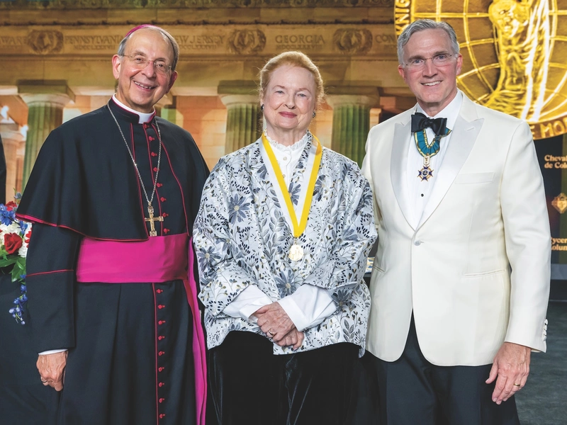 Former U.S. ambassador to the Holy See Mary Ann Glendon stands with the supreme knight and supreme chaplain.