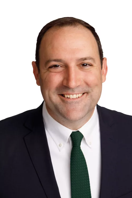 A headshot of Stephen P. White.