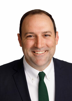 A headshot of Stephen P. White.