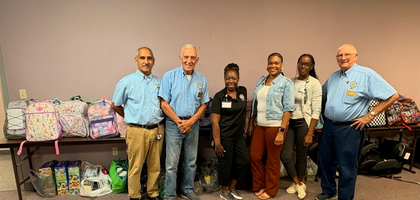 Knights from Danny McMichael Council 12984 in Jackson, Ga., gather with staff from the Georgia Division of Family and Children Services after delivering 40 backpacks filled with more than $4,000 worth of school supplies. The backpacks will be distributed to students in need for the fall semester. Council 12984 has supported the agency for more than a decade.