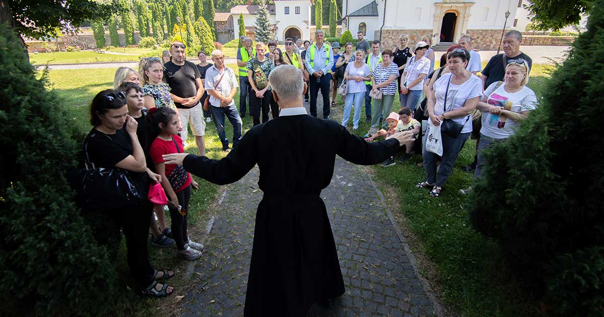 Ukrainian families who have lost loved ones in the ongoing conflict with Russia participate in a pilgrimage to Krekhiv Monastery outside Lviv