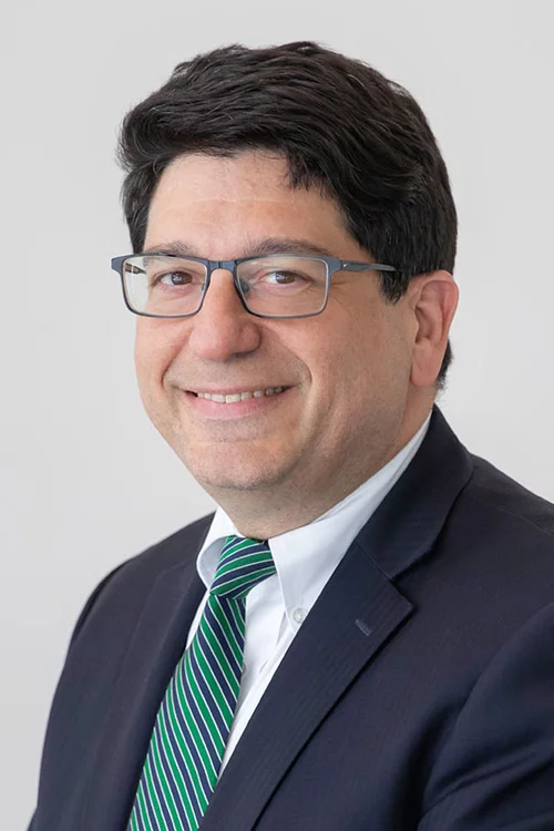 Supreme Advocate Anthony R Picarello, Jr smiles ina portrait.