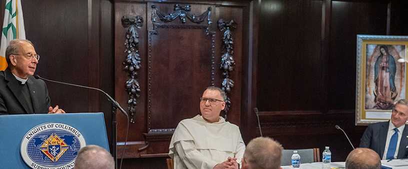 Supreme Chaplain Archbishop William Lori addresses state chaplains during their annual meeting in New Haven June 5. Also pictured to his right are Father Jonathan Kalisch, O.P., director of Chaplains and Spiritual Development, and Supreme Knight Patrick Kelly.