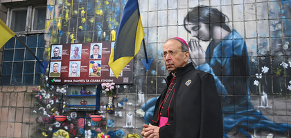 Supreme Chaplain Archbishop William Lori pauses on Yablunska Street in Bucha, Ukraine, during his visit Oct. 19, 2024, to pray for eight men executed by Russian forces during the early days of the war.