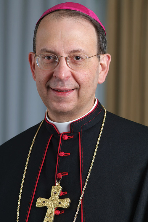 Archbishop William E. Lori, S.T.D. Supreme Chaplain smiles for a portrait.