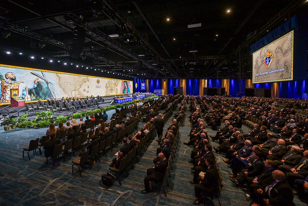 Delegates to the 141st Supreme Convention, along with family members and special guests, listen to the supreme knight&rsquo;s annual report during the opening business session Aug. 1