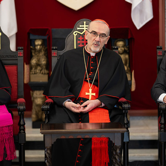 Supreme Knight Patrick Kelly and Supreme Chaplain Archbishop William Lori meet with Cardinal Pierbattista Pizzaballa, Latin patriarch of Jerusalem, in Jerusalem on Sept. 3. (Photo by George Jaraiseh)