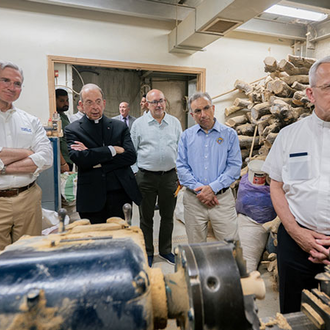Supreme Knight Patrick Kelly, Supreme Chaplain Archbishop William Lori, Supreme Secretary John Marrella and representatives of CNEWA visit Piccirillo Handicraft Center in Bethlehem on Sept. 4. (Photo by Joseph Saadeh)