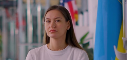 Ukrainian woman sitting for interview.
