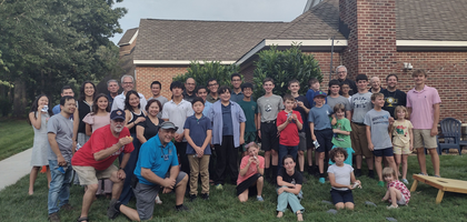 Members of St. Elizabeth Ann Seton Council 8183 in Lake Ridge, Va., gather with nearly 20 altar servers and their families during a picnic hosted by the council at St. Elizabeth Ann Seton Catholic Church to thank them for their service. Attendees enjoyed grilled hamburgers and hot dogs and an evening of outdoor games. Council 8183 has hosted this event annually for more than 35 years.