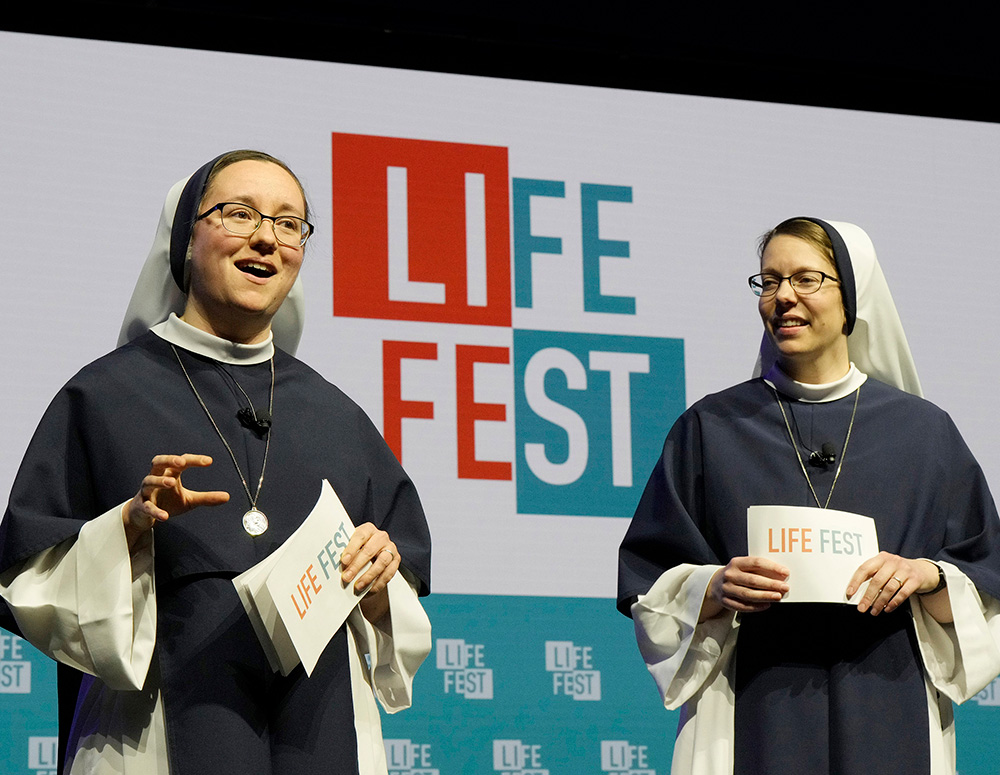 Sister Charity and Sister Cora Caeli of the Sisters of Life serve as emcees during Life Fest at EagleBank Arena in Fairfax, Va., on Jan. 23