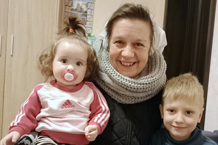 Sister Kamila Frydryszewska cares for two children residing at the congregation’s home for single mothers in Korotych, Ukraine