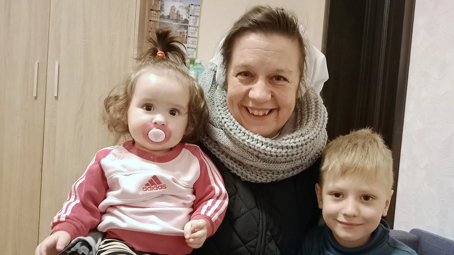 Sister Kamila Frydryszewska cares for two children residing at the congregation’s home for single mothers in Korotych, Ukraine