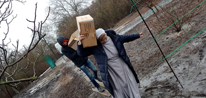 Sister Renata Jurczak of the Little Missionary Sisters of Charity delivers humanitarian aid packages provided by the Knights of Columbus