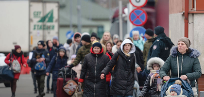 Group of women and children crossing the border