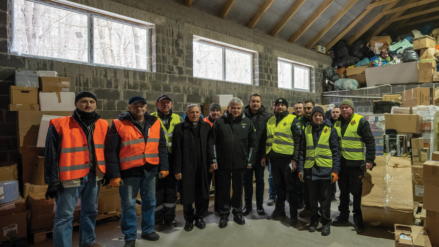 Cardinal Konrad Krajewski visits the Knights of Columbus humanitarian aid warehouse in Briukhovychi, Ukraine.
