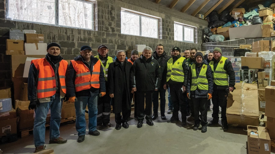 Cardinal Konrad Krajewski visits the Knights of Columbus humanitarian aid warehouse in Briukhovychi, Ukraine.