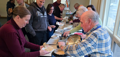 Thomas Sileo Sr., program director for St. Thomas à Becket Council 9781 in Reston, Va., serves vegetable soup during a soup supper hosted by Council 9781 at St. Thomas à Becket Catholic Church.