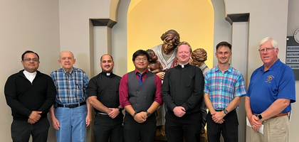 Members of Prince of Peace Council 11537 in Hoover, Ala., gather with four Diocese of Birmingham seminarians at Prince of Peace Church to present each with $2,500 to support his seminary formation. Fourteen additional seminarians received the same amount by mail. Over the last five years, Council 11537 has raised nearly $175,000 for Birmingham seminarians through the Refund Support Vocations Program (RSVP).