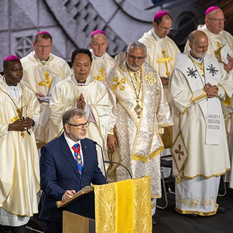 Poland State Deputy Marek Zietek reads one of the prayers of the faithful in Polish during the Aug. 7 votive Mass of Sts. Joachim and Anne at the 142nd Supreme Convention in Québec City.