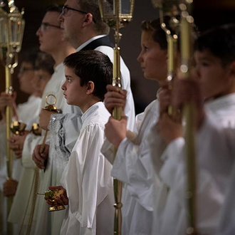 Acolytes assist at the votive Mass of Sts. Joachim and Anne at the 142nd Supreme Convention in Québec City on Aug. 7.