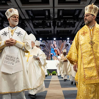 Metropolitan Archbishop Borys Gudziak (left) of the Ukrainian Greek Catholic Archeparchy of Philadelphia and Bishop Mykhaylo Bubniy (right) of the Exarchate of Odesa process out of the Aug. 7 Mass 
