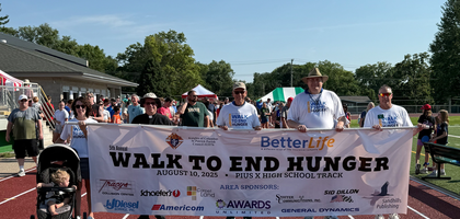Members of Msgr. David R. Hintz Council 13576 in Lincoln, Neb., help lead about 350 people in the annual Walk to End Hunger fundraiser at Pius X High School. Several local councils supported the event, with Council 13576 as one of the principal cosponsors. Donations totaled 69,000 pounds of food and $68,000 to support the Catholic Social Services of Southern Nebraska’s food pantry.