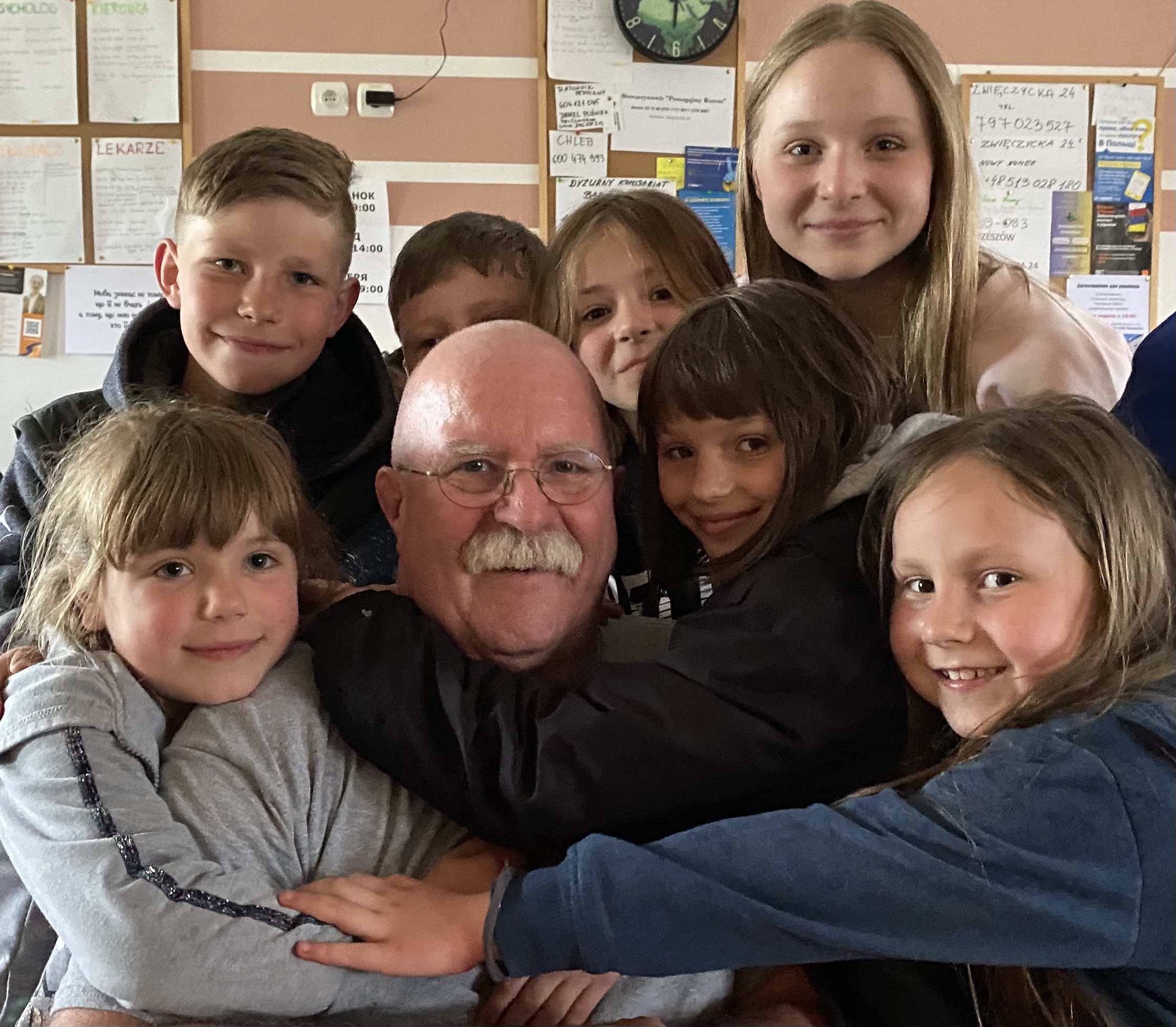 Wally Connor, executive director of S.O.N.G. (Supporting Orphans Nationally and Globally) and past grand knight of Sacred Heart Council 11080 in West Brookfield, Mass., visits with Ukrainian children at the Southside Refugee House in Rzesz&oacute;w, Poland, in May 2022