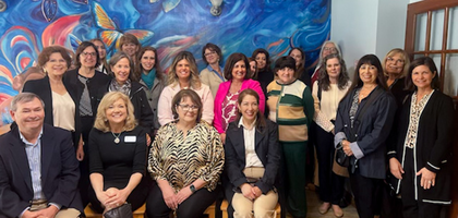 Wives of supreme officers and directors, including Vannessa Kelly (seated, right), wife of Supreme Knight Patrick Kelly, visit Our Lady’s Inn, a maternity home in Defiance, Mo., that has been supported by local Knights through the ASAP program.