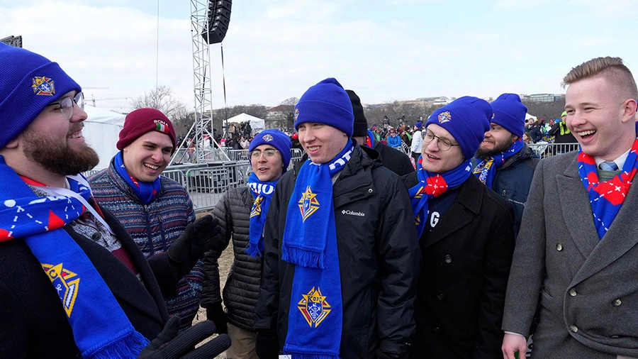 Andrew Hodgson (left), a student at the University of Wisconsin-Madison and chairman of the Knights of Columbus College Advisory Board, talks with fellow college Knights at the conclusion of the March for Life rally in Washington, D.C., Jan. 24. 