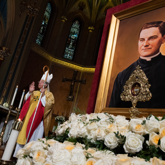 Archbishop William Lori bestows a blessing during the Mass of Thanksgiving at St. Mary's Church on November 1, 2020.