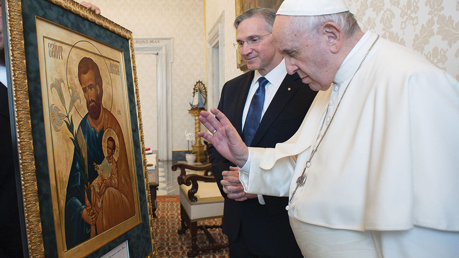 State deputies stand with blessed images of St. Joseph icon