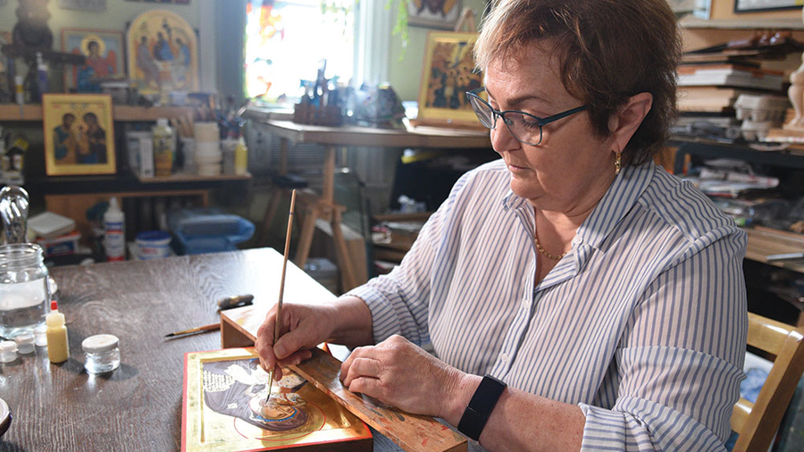 Iconographer Élizabeth Bergeron, pictured here with some of her work